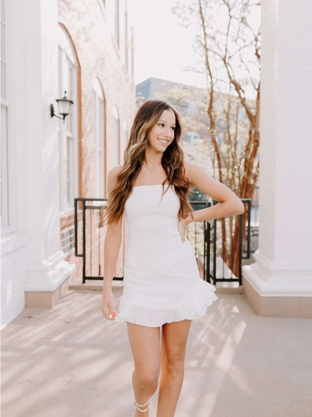 Lucy in the Sky White Ruffle Hem Tie-Open Back Mini Dress in White - Womens